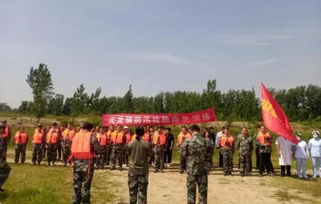 火龍鎮(zhèn)開展防汛搶險應急演練,錘煉實戰(zhàn)本領